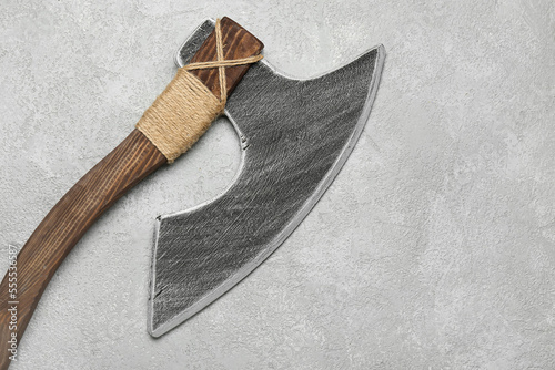 Sharp ax on grunge backgrou...