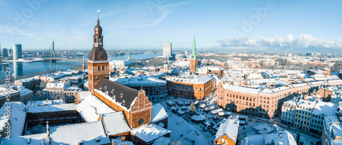 Beautiful Christmas market in the center of the old town in Riga, Latvia with a huge decorated Christmas tree.