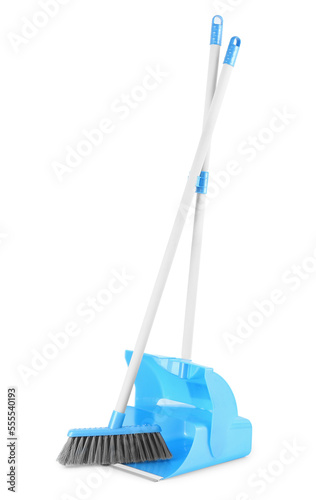 Cleaning broom and dustpan on white background
