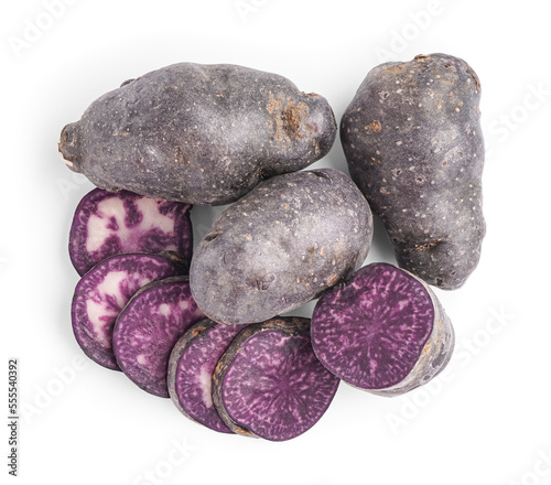 Heap of raw purple potatoes on white background