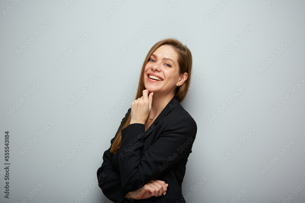 Smiling thinking business woman profile portrait with copy space. Smiling thinking business woman profile portrait with copy space.