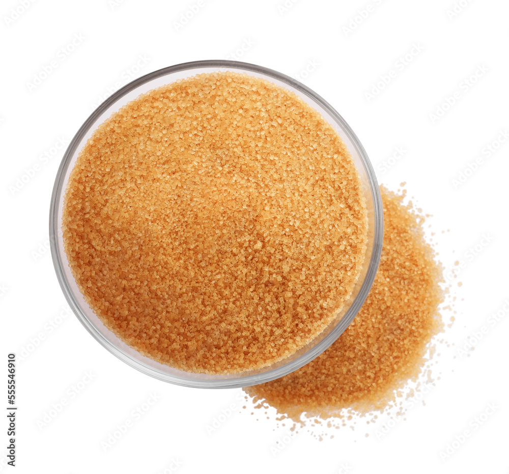 Glass bowl and granulated brown sugar on white background, top view Glass bowl and granulated brown sugar on white background, top view