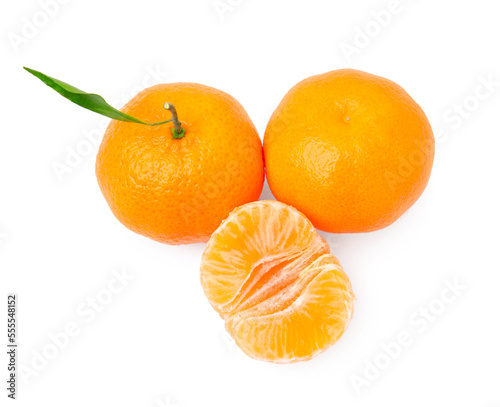 Fresh ripe juicy tangerines with green leaf on white background, above view