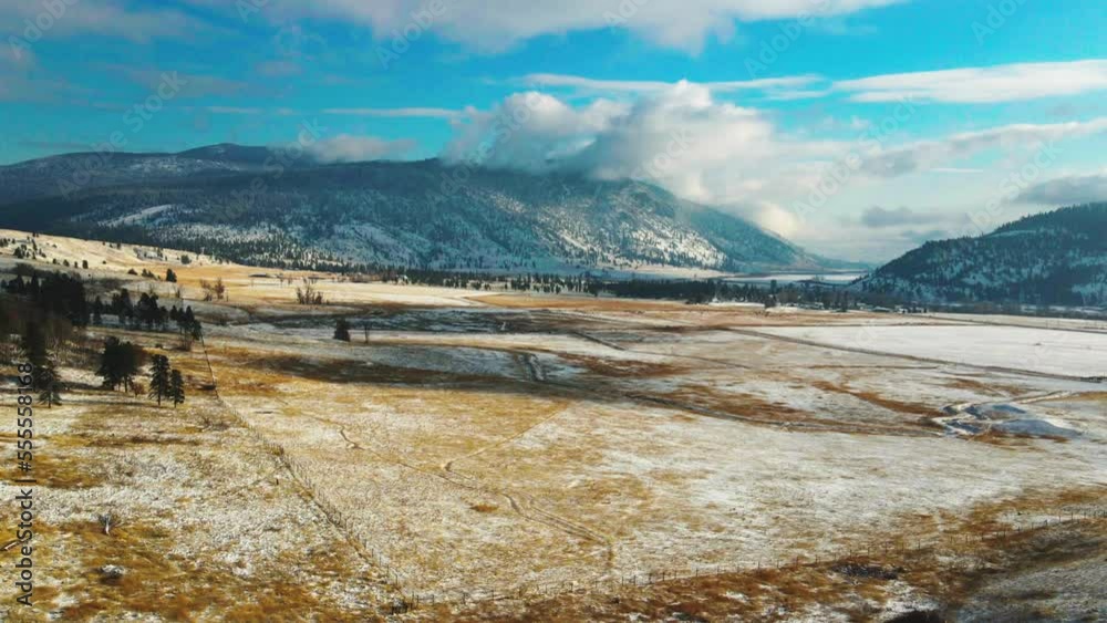 Hyperlapse of the Grasslands of the Nicola Valley covered in light snow on a partly cloudy day in the winter with sunshine in Merritt, BC Canada Hyperlapse of the Grasslands of the Nicola Valley covered in light snow on a partly cloudy day in the winter with sunshine in Merritt, BC Canada