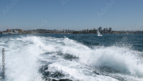 Ships and Yacht at Darling Harbour Sydney Australia general view cityscape vawes and splash