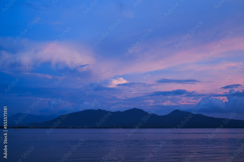 sunset on Dermaga Cinta Beach, Banyuwangi. Sunset with view of Bali Island. Sunset over the sea. sunset on Dermaga Cinta Beach, Banyuwangi. Sunset with view of Bali Island. Sunset over the sea.