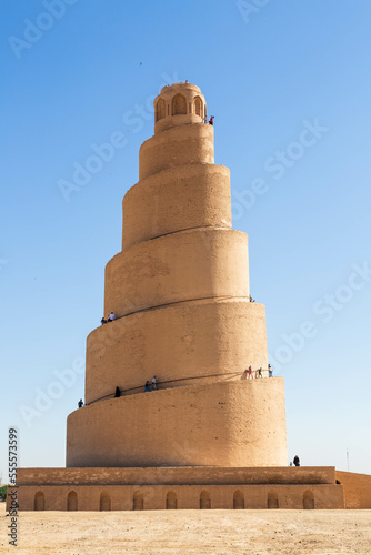 Samarra, Iraq - November 2022: Minaret Malwia in Samarra and people walking to the top