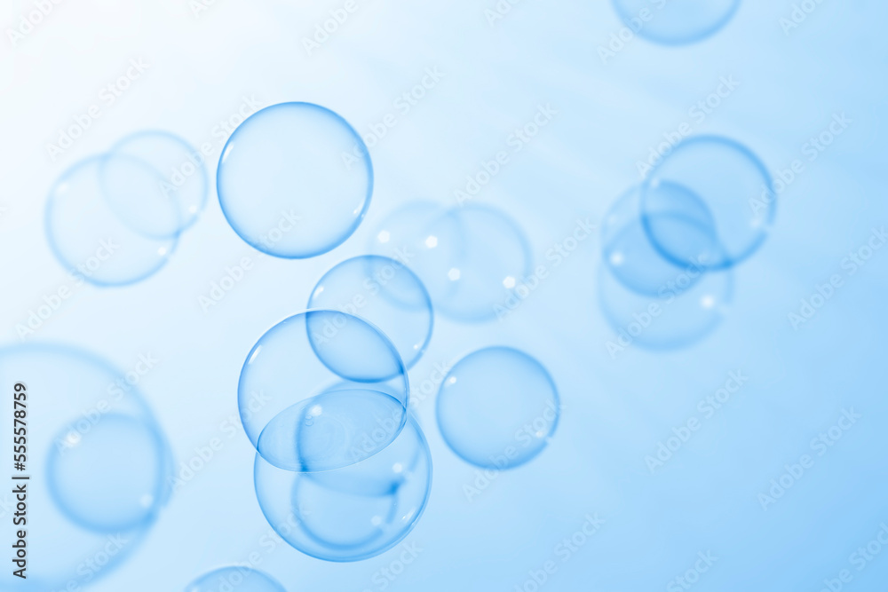 Beautiful Transparent Blue Soap Bubbles Abstract Background. Soap Sud Bubbles Water.