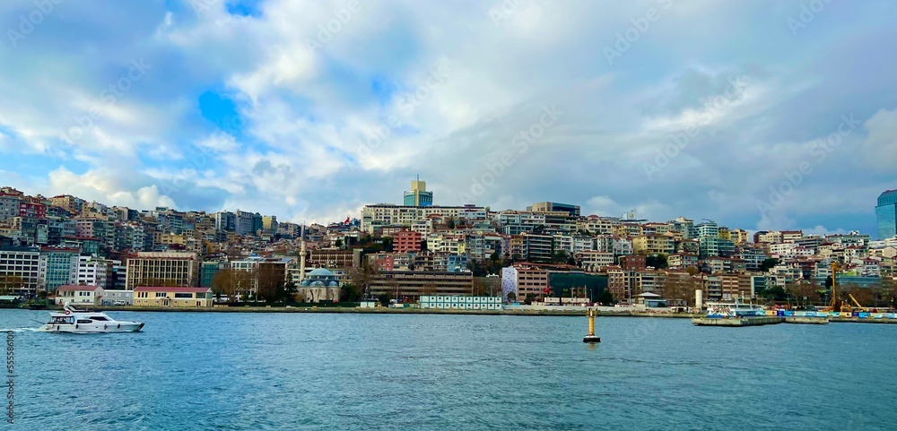 Bosphorus Strait. View from the sea to the city in colors. Flying seagulls over the water Bosphorus strait connecting the Black Sea with the Marmara