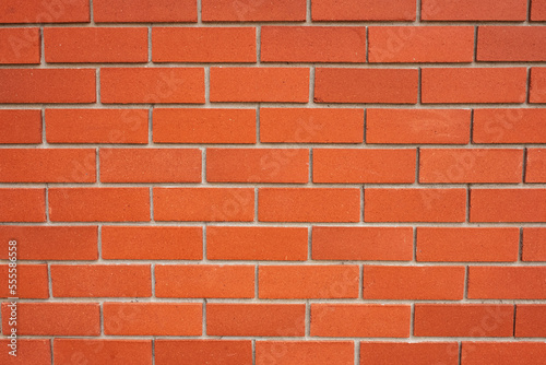 Beautiful red brick wall, details. New brick wall pattern background.