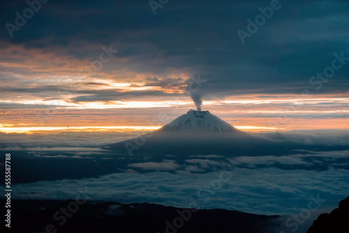 Sunrise in Quito city with Cotopaxi volcano in the background