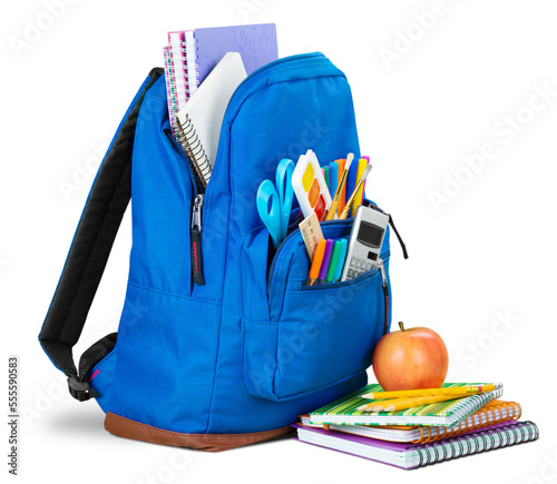 Foto Classic school backpack with colorful school supplies and books