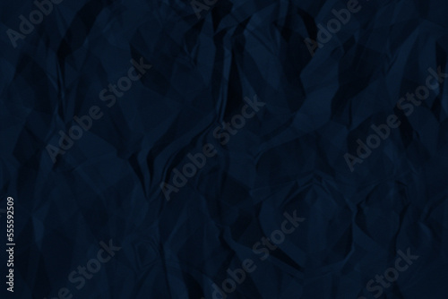 Dark blue Black crumpled paper texture background. A crumpled sheet of dark gray paper abstract background.