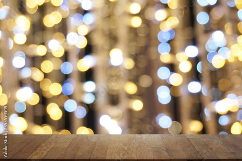 christmas lights on a wooden background