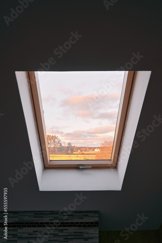 Wooden interior roof window photo.