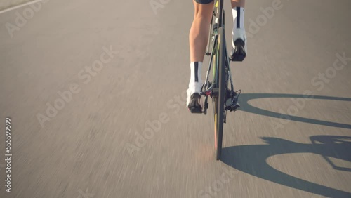 cycling on bicycle. athlete pedaling on bicycle . strong legs