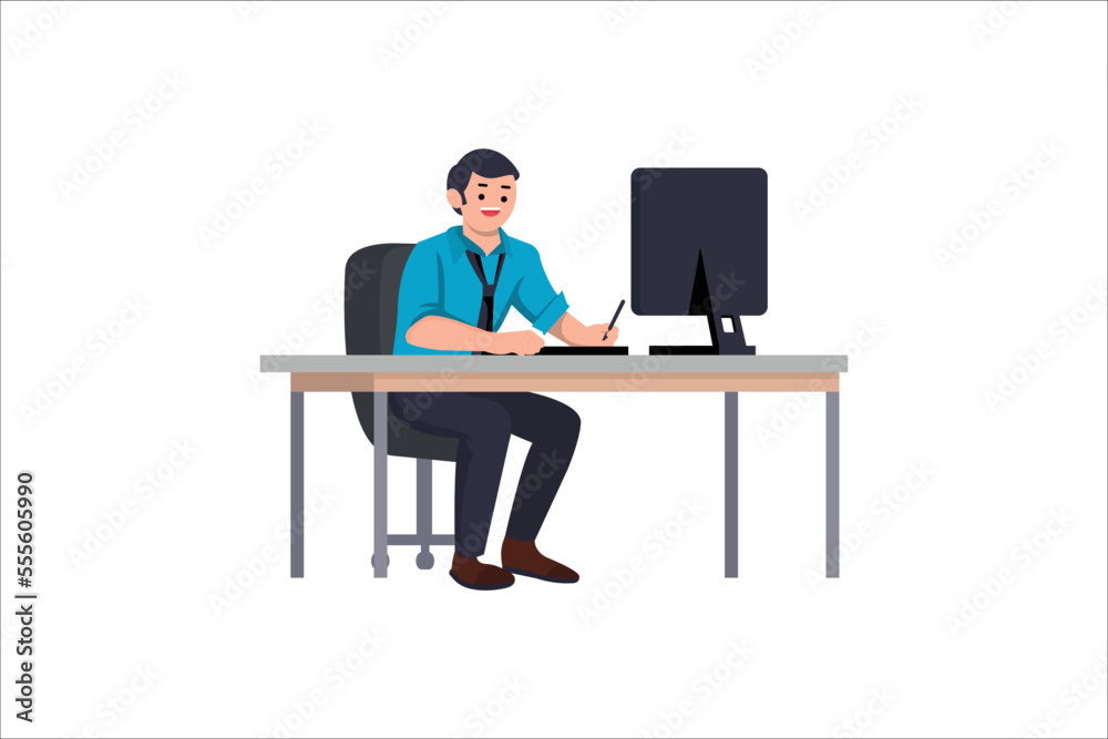 Cute Young Guy Sitting at Desk and Working on Computer. Cute Young Guy Sitting at Desk and Working on Computer.