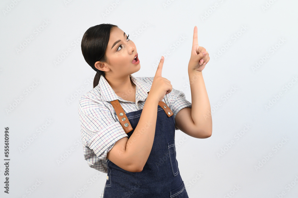Portrait Asian young woman smile with happy in waitress uniform Portrait Asian young woman smile with happy in waitress uniform