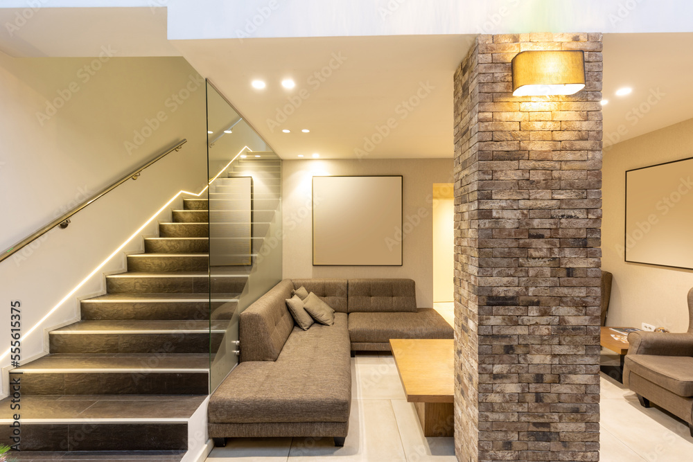 Interior of a modern hotel apartment with brick wall decoration Interior of a modern hotel apartment with brick wall decoration