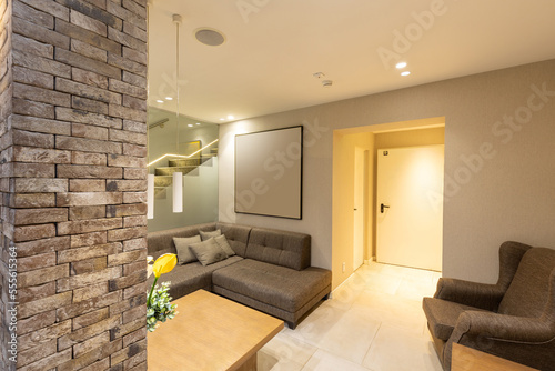 Interior of a modern hotel apartment with brick wall decoration