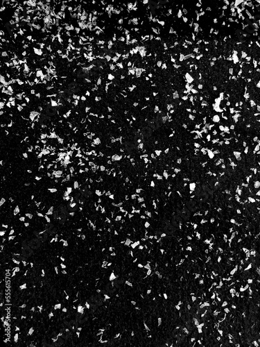 Abstract white particles. snow on black background for design