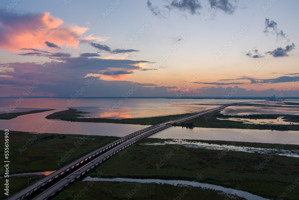 sunset over the highway on mobile bay sunset over the highway on mobile bay