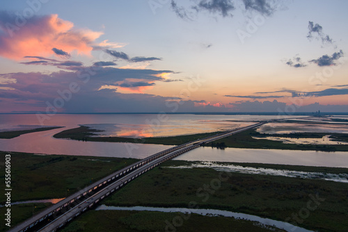 sunset over the highway on mobile bay 