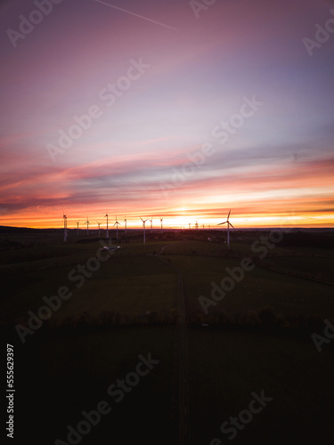 Couple of windmills during sunset