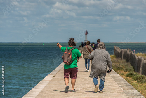 Fotografi En promenade sur la digue de Boyardville, île d'Oléron, Charente-Maritime, Franc