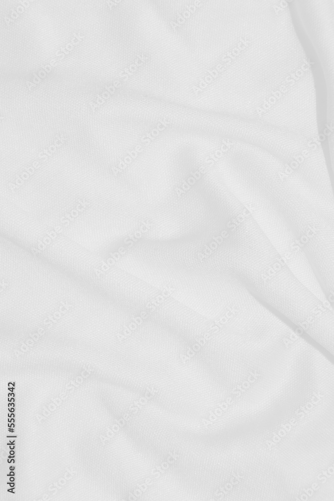 Fototapeta premium A clean white cloth with swaying streaks for the background.
