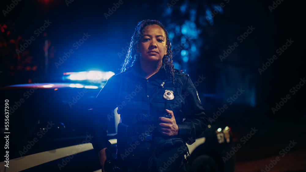 Professional Blaсk Female Police Officer Looking at the Camera. Policewoman Maintains public order and safety, Enforcing the Law, Prevents and Investigates Criminal Activity. Medium Portrait