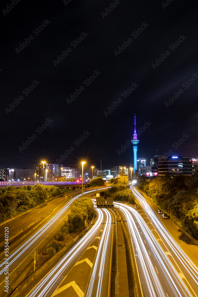 Auckland City busy traffic on the highway at night, New Zealand