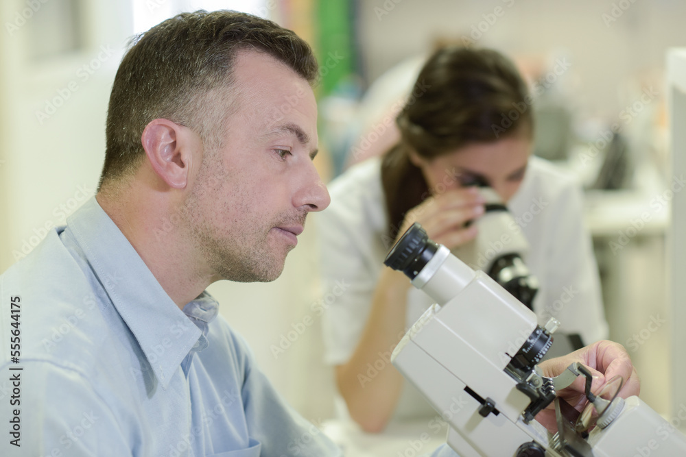 a man with a microscope a man with a microscope