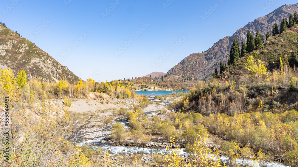 golden autumn in the mountains. beautiful mountain lake. turquoise watercolor golden autumn in the mountains. beautiful mountain lake. turquoise watercolor