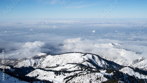 Wallpaper Mural mountain peaks in the clouds. cloud mountains. misty peaks Torontodigital.ca