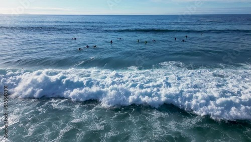 Surfers Over Huge Waves In The Paradise Beach Of Playa de Caion In Galicia, Spain. Aerial Drone Shot