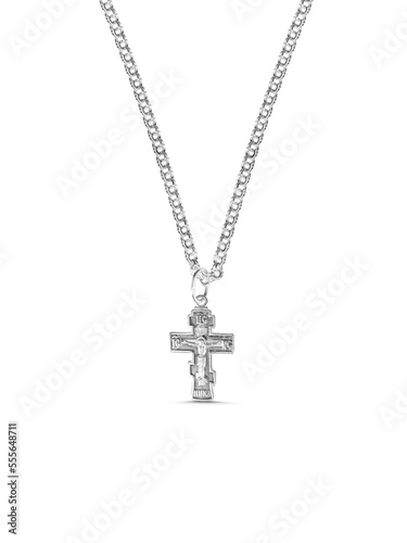 isolated on white background jewelry silver cross on a chain with a shadow