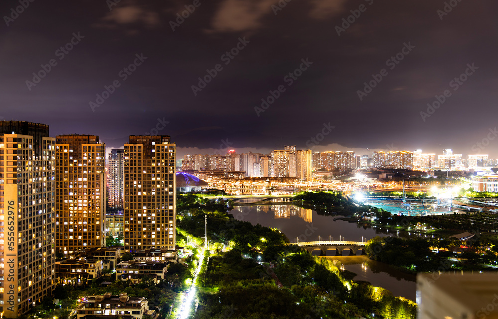Obraz premium Modern city buildings at night