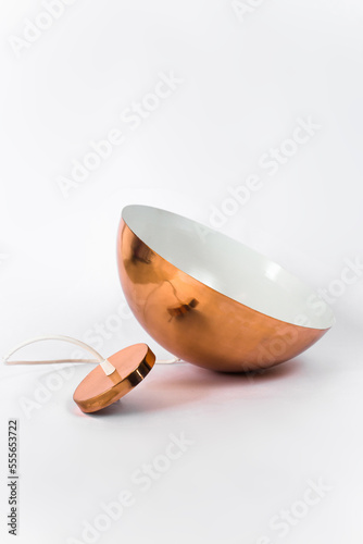 Copper semi sphere lamp. Minimalist lamp design for home interior. Home deco. photo