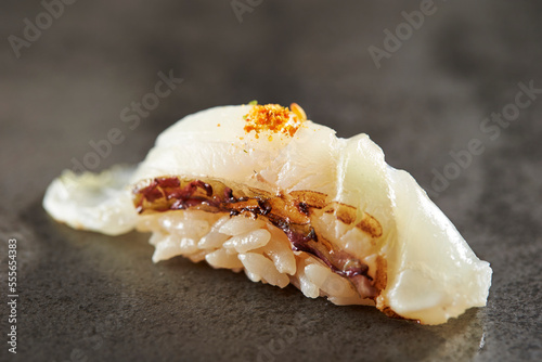 Sea bream sushi close-up on gray background photo