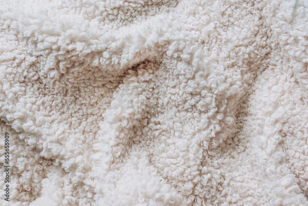 Soft cozy white fur background, close up