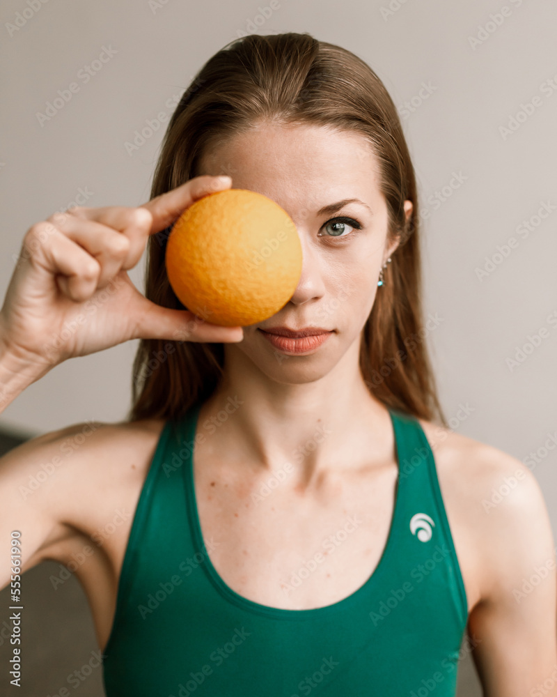 a beautiful girl does fitness in a bright hall with myofascial rolls a beautiful girl does fitness in a bright hall with myofascial rolls