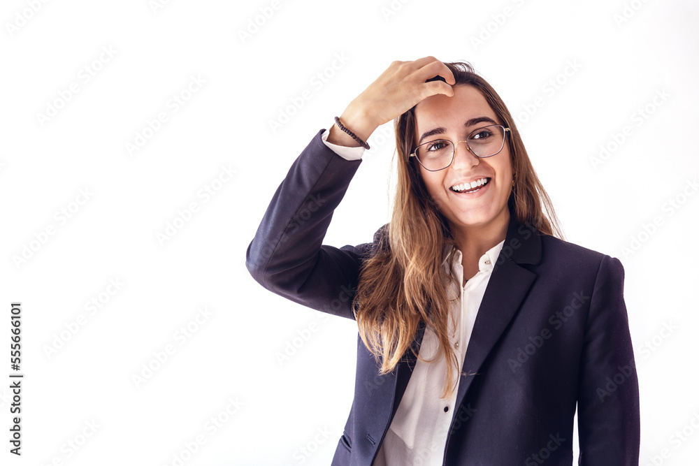 Young businesswoman in a suit combing her hair with her hand with white background. Young businesswoman in a suit combing her hair with her hand with white background.