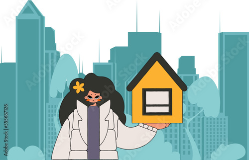 Concept Investment in real estate. Real estate realtor girl holding a house.