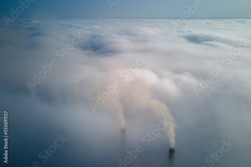 Wallpaper Mural Coal power plant high pipes emitting black poisonous smoke moving upwards over white fog polluting air. Production of electrical energy with fossil fuel concept Torontodigital.ca