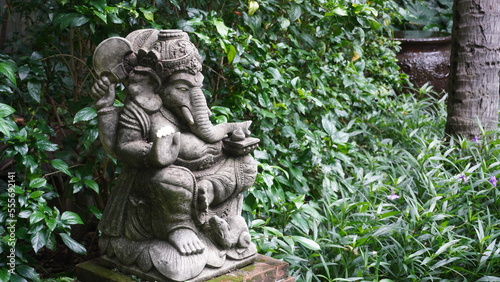 Calm quite Public park with statue on huge old tree. Greenery environment suitable for relaxation and meditation