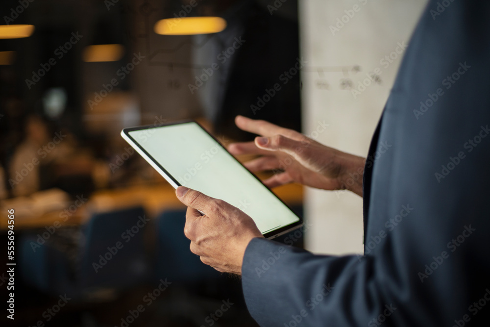 Close up of man using digital tablet. Close up of man using digital tablet.