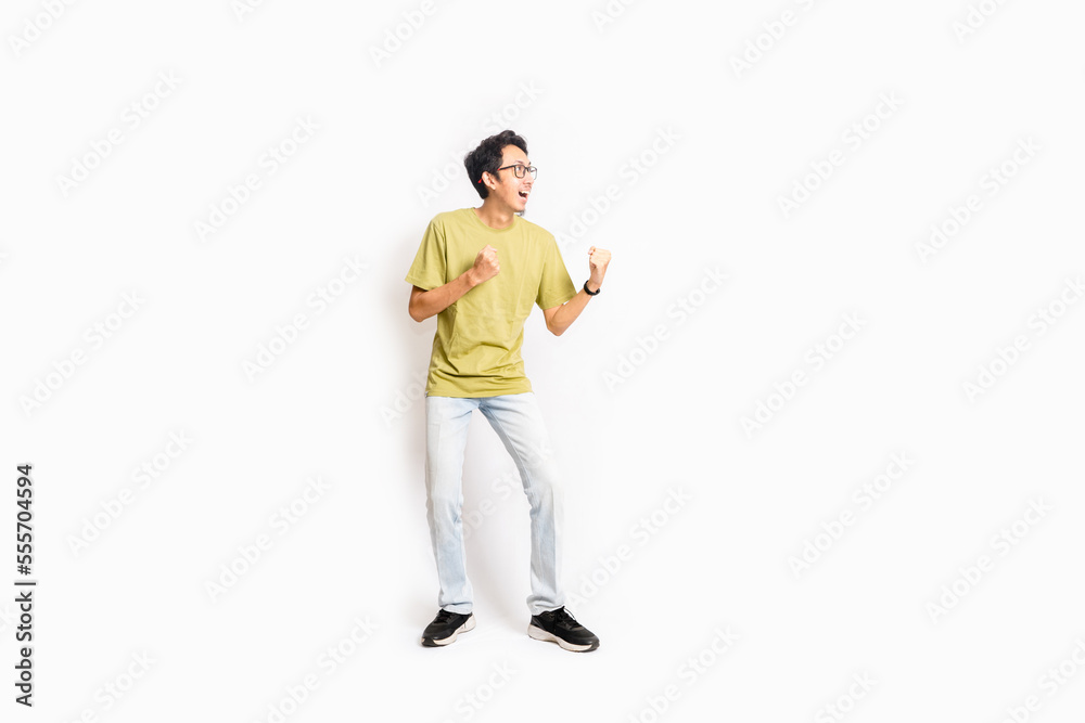Single skinny young male. The full body of an Asian or Indonesian person. Isolated photo studio with white background. Single skinny young male. The full body of an Asian or Indonesian person. Isolated photo studio with white background.