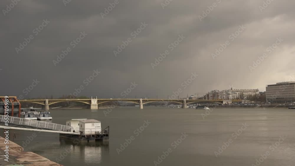 The river Danube in Budapest, Hungary on a cloudy day. The river Danube in Budapest, Hungary on a cloudy day.