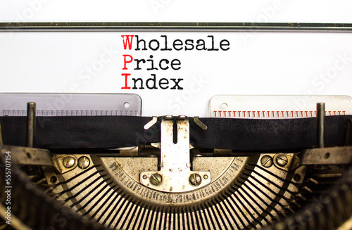 WPI wholesale price index symbol. Concept words WPI wholesale price index typed on old retro typewriter. Beautiful white background. Business WPI wholesale price index concept. Copy space. photo